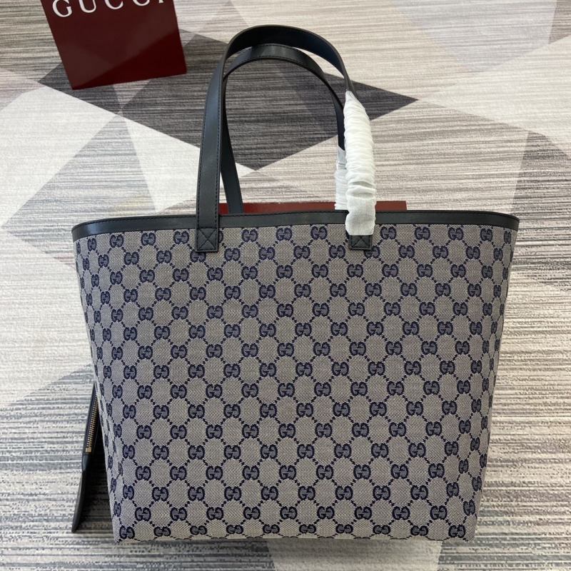 G*u*i shopping bags